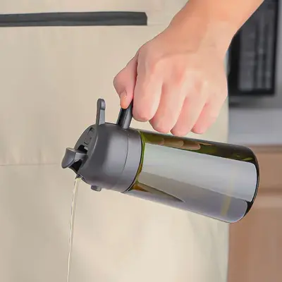 Sınır Ötesi Işık Geçirmeyen Cam Yağ Şişesi Püskürtme Döküm Çift Amaçlı Bütünleşik Yağ Damlamayan Ev Tipi Yağ Şişesi Mutfak İnce Püskürtme Yağ Şişesi