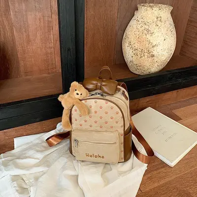 Women's Backpack with Cartoon Puppy Paw Design and Bow, Large Capacity - 9