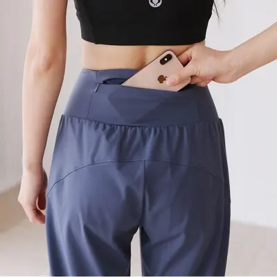 Women's sports yoga pants with zipper pockets, quick-dry