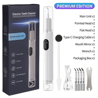 Ultrasonic water spray dental cleaner