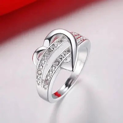 Cao Shi neue Europa- und Amerika-Mode Damen RINGE personalisierter doppelschichtiger herzförmiger Ring, eleganter und prächtiger Damenring