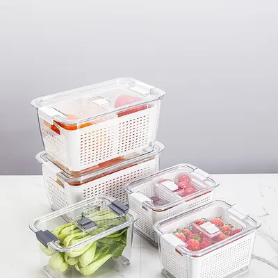 Kitchen refrigerator storage container with dividers and drain