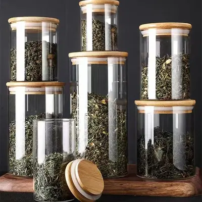 Hersteller Großhandel mit hohem Borosilikatglas, versiegeltes Glas, Aufbewahrungsflasche, Süßigkeiten-Aufbewahrungsglas, gerades Rohr, Teeglas, Bambusdeckel, Teeglas