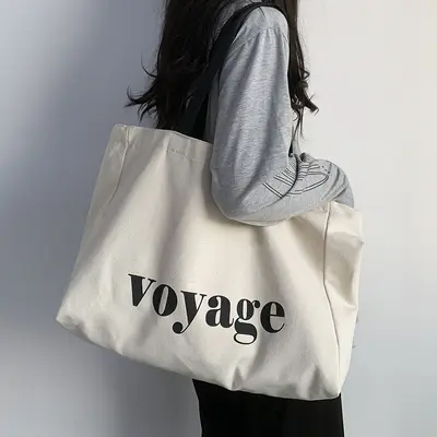 Leere Leinwandtasche, großes Fassungsvermögen, schlichte Reisetasche, bedruckte Yogatasche mit Buchstaben, Umhängetasche, Ins-Stil-Tasche, Schülerbuchtasche für Männer und Frauen.