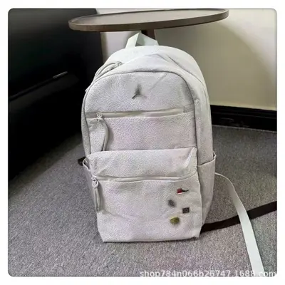 AJ Feiren 23 student backpack with badge design