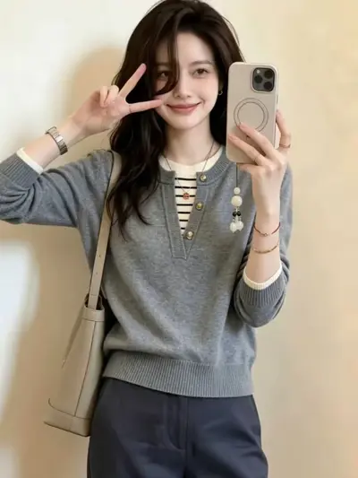Damen-Strickpullover mit gestreifter Fake-Zweiteiler-Optik, lockere Passform