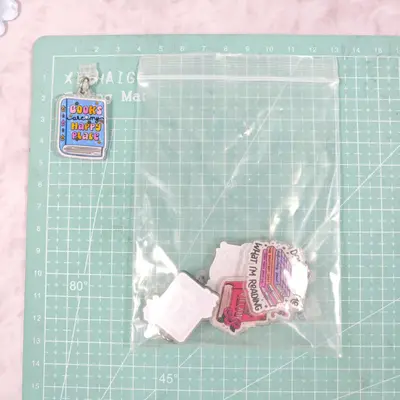 Acrylic cartoon book dust plug pendant style