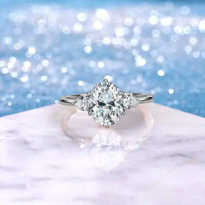 Cross-border Bestseller S925 Sterling Silver Moissanite Ring, Light Luxury Three-Stone Style, Egg-Shaped and Pear-Cut Ring, Niche Design Sense