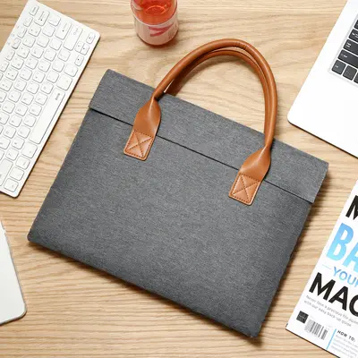 Sınır ötesi yeni moda laptop çantası iş 15.6 laptop çantası hafif ve sade erkek evrak çantası
