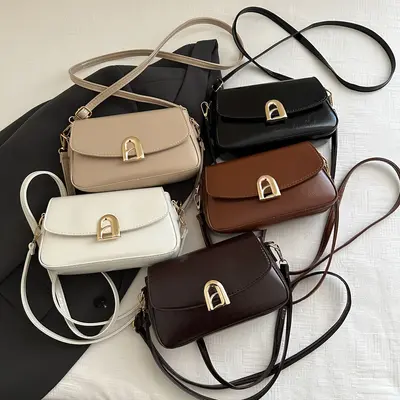 Großhandel strukturierte leichte luxuriöse handgetragene kleine quadratische Tasche Damenhandtasche 2025 Sommer neue Mode verschließbare Schultertasche tägliche Crossbody-Tasche