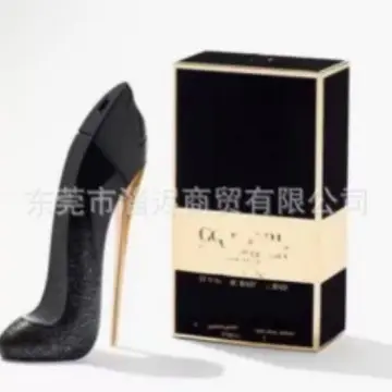 Good Girl Supreme Perfume and Black High Heels