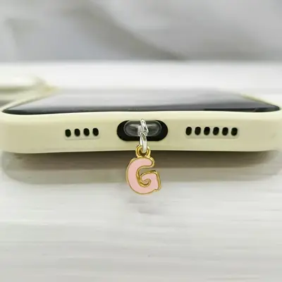 Cep telefonu toz fişi alaşım pembe mektup çekicilik toz fişi evrensel cep telefonu tozluk aksesuarları metal malzeme