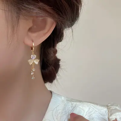 Lightweight luxury clover earrings with tassel detail