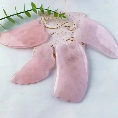 Amazon grenzüberschreitend meistverkaufte wertvolle Stein-Kratztabletten natürlicher rosa Kristall Herzform Horn Beruhigung und Beauty-Massage aktiviert