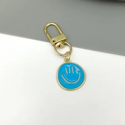 Regenbogen-Metall-Smiley-Schlüsselanhänger, Geschenk zum Schulanfang