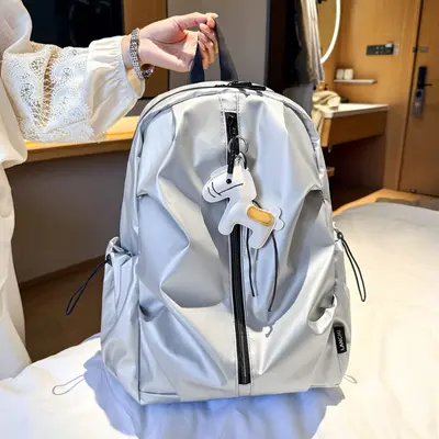 Lightweight Backpack, Large Capacity Shell Design, Unisex Travel and Commuter Bag - 1