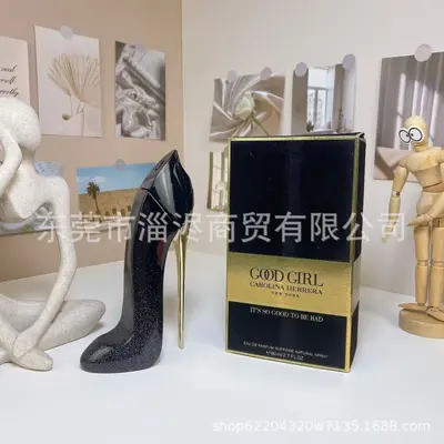 Good Girl Supreme Perfume and Black High Heels
