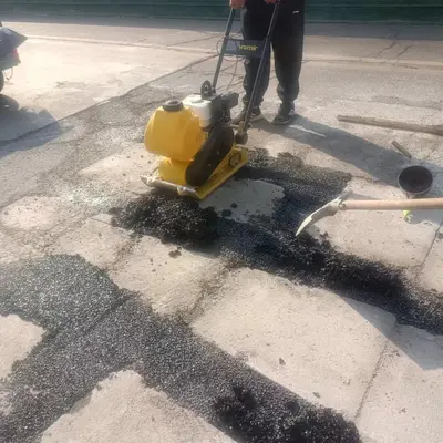 Asphalt Cold Patch Material for Potholes and Manhole Cover Cracks