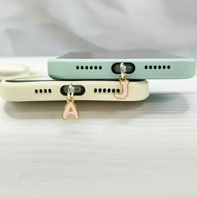 Cep telefonu toz fişi alaşım pembe mektup çekicilik toz fişi evrensel cep telefonu tozluk aksesuarları metal malzeme