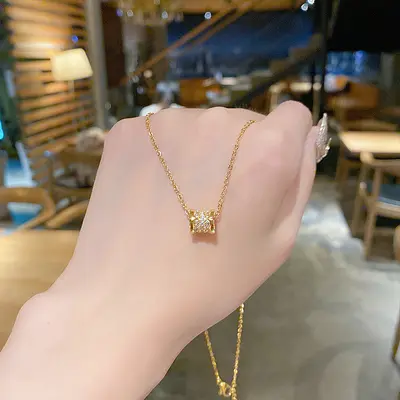 Factory price copper micro-inlaid real gold plated titanium steel women's necklace, lightweight luxury niche summer clavicle chain, high-end design.