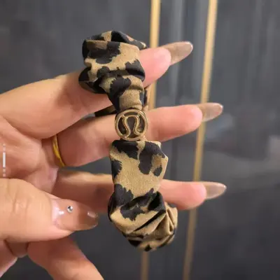 Elastic Ponytail Hair Tie with Metal Logo