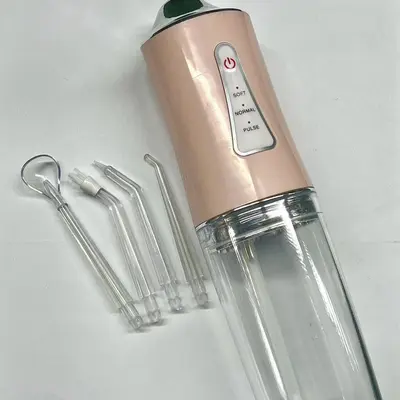 Portable electric oral irrigator with intelligent pulse technology