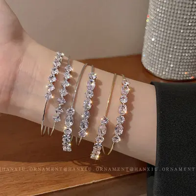 Zircon ribbon open bangle bracelet