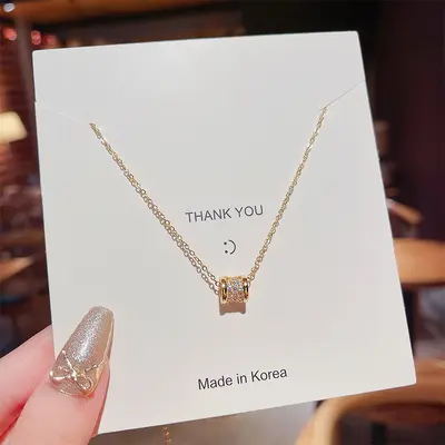 Factory price copper micro-inlaid real gold plated titanium steel women's necklace, lightweight luxury niche summer clavicle chain, high-end design.