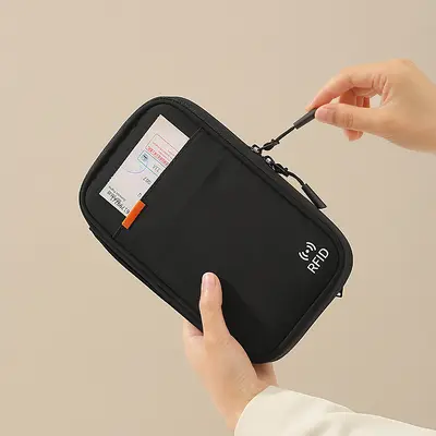 Passport holder, portable travel document organizer