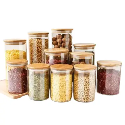 Hersteller Großhandel mit hohem Borosilikatglas, versiegeltes Glas, Aufbewahrungsflasche, Süßigkeiten-Aufbewahrungsglas, gerades Rohr, Teeglas, Bambusdeckel, Teeglas