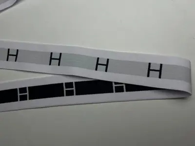 Elastic Rubber Band with Letter Print, Black Text on White Background - 9