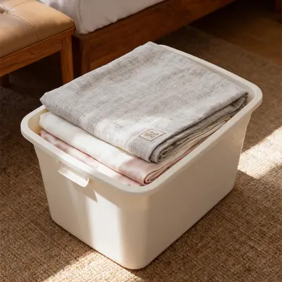 Extra large plastic storage box for clothing and toys