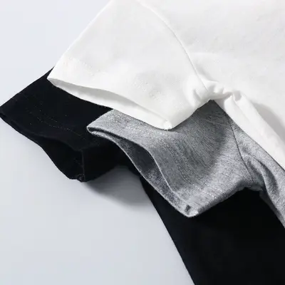 Baby-Kurzarmshirt, Rundhals, Schulterknöpfe, Baumwolle, einfarbig