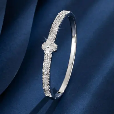 Vierblatt-Blüten-Kupferarmband, vergoldet, mit Zirkonia besetzt - 3