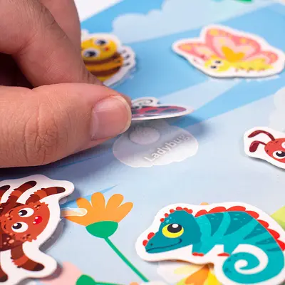 Quiet book with DIY stickers for early learning and logic development