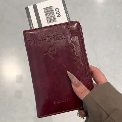 Passport holder with multi-functional storage for cards, documents and tickets - 11