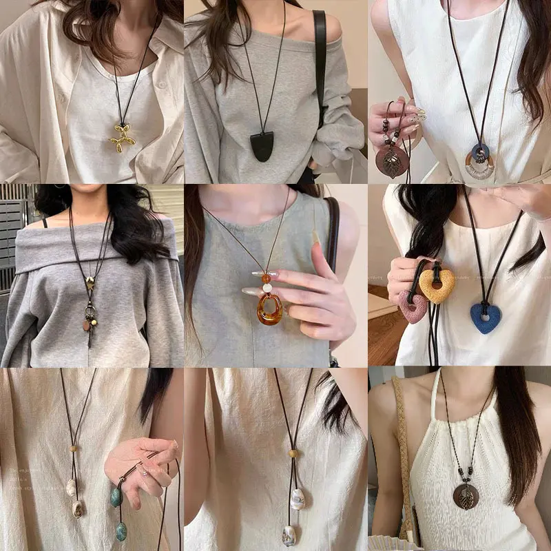 Round ring pendant necklace, black cord, long chain style