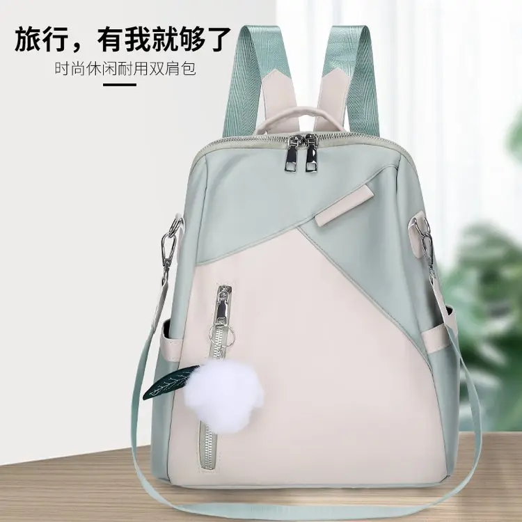 Multifunktionaler PU-Rucksack mit Pompon-Anhänger Damen