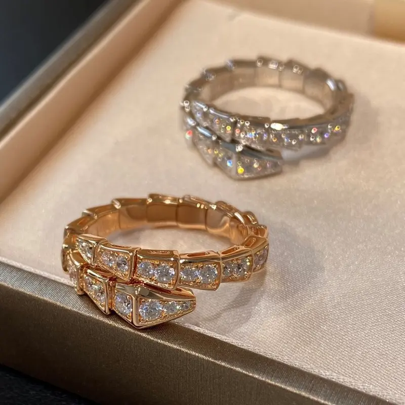 Bao Ge Seiko V Gold Electrolysis Plated Full Diamond Snake Bone Ring, White Mother-of-Pearl Snake-Shaped Open Ring for Women in Light Luxury Style.
