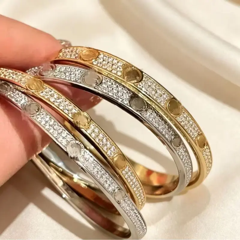 Wide round three-row crystal bracelet, metal snap clasp